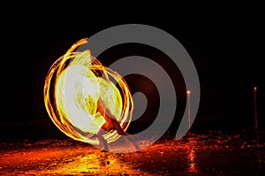 Fire-show man in action with fire