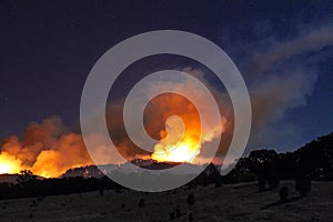 Fire and smoke plume at night