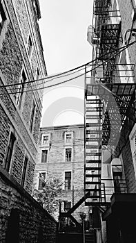 Fire stairs in the back of stone house buildings in the old town of Quebec City, Canada