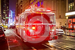 Fire truck with emergency lights on the street