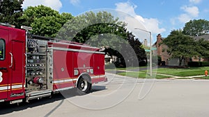 Fire truck equipment. Firetruck Responds to house call. federal heights in suburbs . Wide view