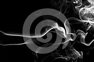 Fire of white smoke on black background. abstract movement
