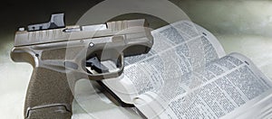Firearm and bible open