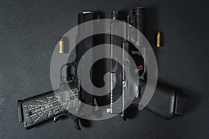 Firearms, modern tactical 9mm pistol and classic 45 caliber pistol
