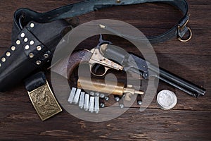 Firearms of the Old West - Percussion Army Revolver with paper cartridges, bullets, powder flask and holster
