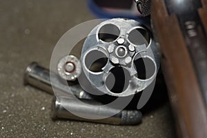 Firearms Revolver shooting bullets with gun blur.