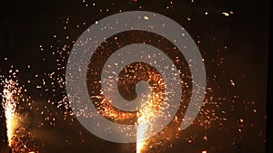 Fireball fire performance with sparks in a circle