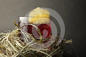 Fireball whisky cocktail wrapped in a nest. photo