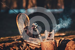 Firebox stove in the camp during fishing