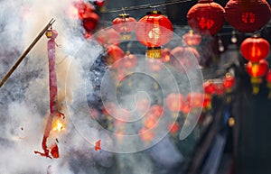 Firecrackers are exploding with flashes and smoke in Lunar new year