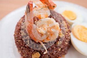 Fired brown rice with shrimp, carrot and boiled egg healthy clean food none oil added