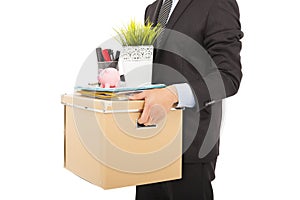 Fired businessman carrying his belongings