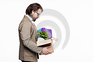 Fired businessman holding box with personal belongings isolated on white background