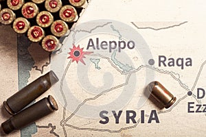 The fired cases and bullets from rifle. Background view on section area of Aleppo, Syria. photo