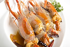 Fired giant freshwater prawn with tamarine sauce on with plate closeup shot