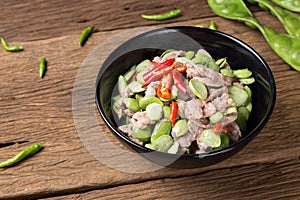 Fired Parkia speciosa beans with Shrimp paste and pork (Pad Sa tor Ka pi Moo) traditional Thai food from South of Thailand