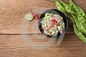 Fired Parkia speciosa beans with Shrimp paste and pork (Pad Sa tor Ka pi Moo) traditional Thai food from South of Thailand