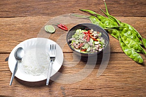 Fired Parkia speciosa beans with steam rice (Pad Sa tor Ka pi Moo) traditional Thai food from South of Thailand beautiful thai foo