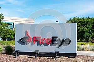 FireEye sign and logo is displayed near cybersecurity company campus