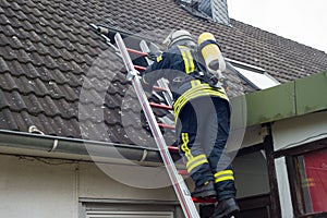 Firefighter in action and extinguish apartment fire - Serie Firefighter