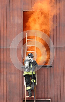 firefighter in action in the fire station with self-contained br