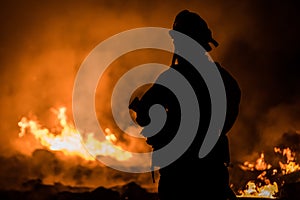 Firefighter Battling Structure Fire