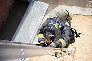Firefighter climb on fire stairs