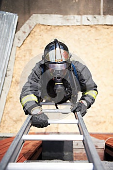 Firefighter climb on fire stairs