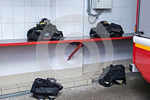 Firefighter clothes and helmet ready to dress