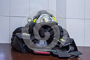 Firefighter clothes and helmet ready to dress