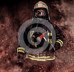 A firefighter dressed in a uniform in a studio.