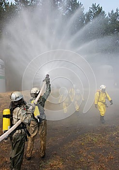Firefighter extinguishes fire
