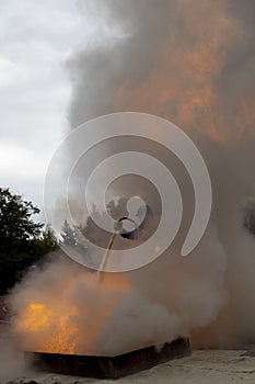 Firefighter extinguishes fire