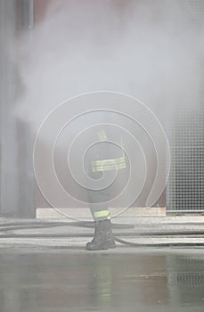 firefighter extinguishes the fire photo