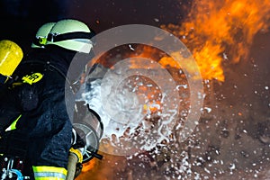 Firefighter - Firemen extinguishing a large blaze