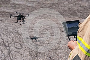 Firefighter flying rescue drone