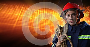 Firefighter in front of burning hot grid