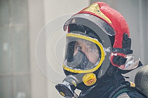 Firefighter with frozen uniform