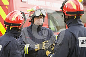 A firefighter giving instructions to his team