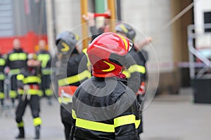 Firefighter with hardhat during outdoor exercise