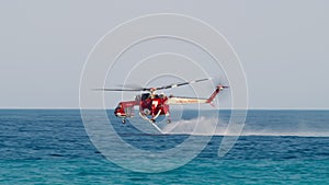 Firefighter Helicopter of Italian Vigili del Fuoco Suck Water From Ocean