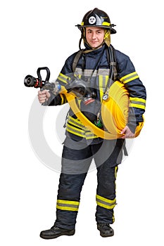 firefighter holds fire hose with fire nozzle in hands and looking at camera