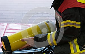 A Firefighter with oxygen cylinder