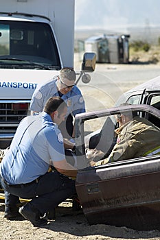 Firefighter And Paramedics At Crash Scene