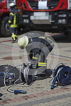 Firefighter prepare equipment