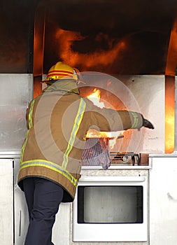 Firefighter putting out fire