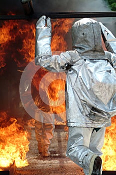 Firefighter with retardant suit photo