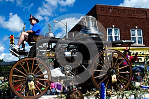 Old fashioned fire engine in parade