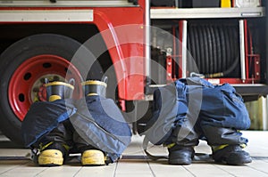 Firefighter's boots and trousers in a fire station