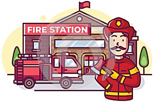 Firefighter standing in front firestation with firetruck